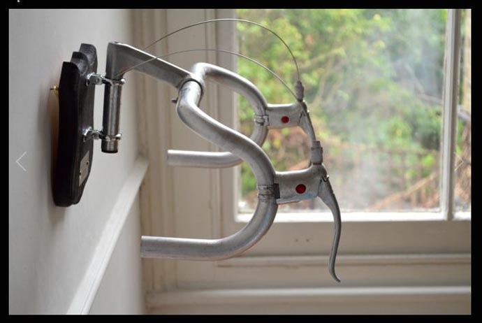 Bicycle handlebars mounted on plaque